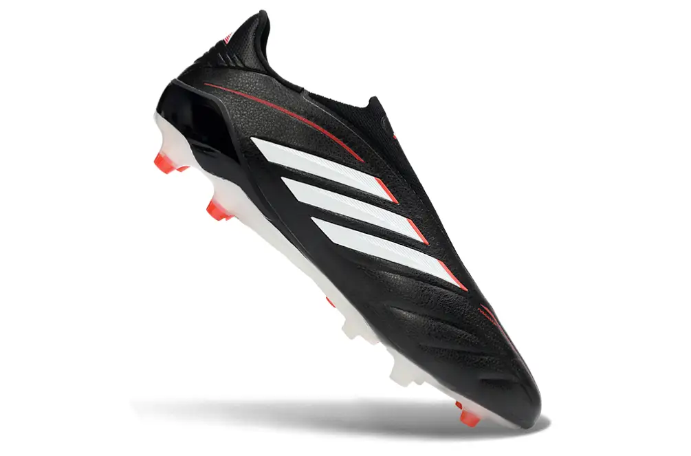 Adidas Copa Pure IV Elite Laceless FG in action on grass